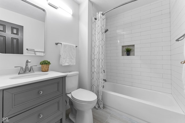 full bathroom with vanity, toilet, and shower / bath combo