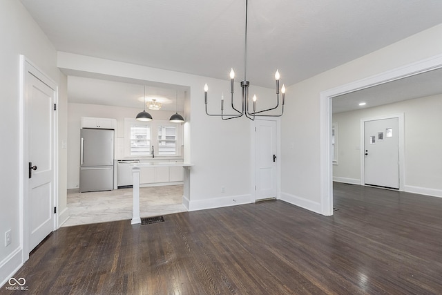 unfurnished dining area with hardwood / wood-style floors