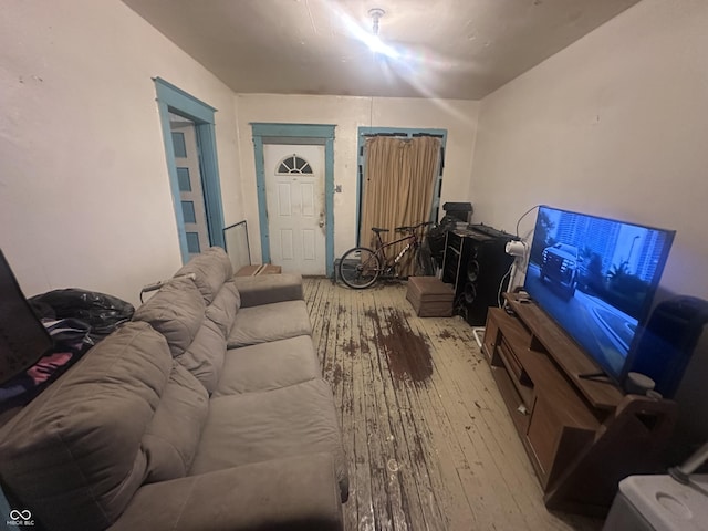 living room with light hardwood / wood-style flooring