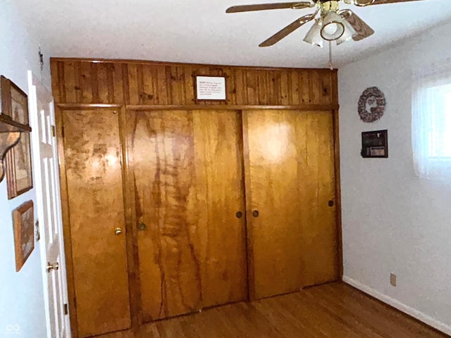 interior space with hardwood / wood-style flooring and a closet