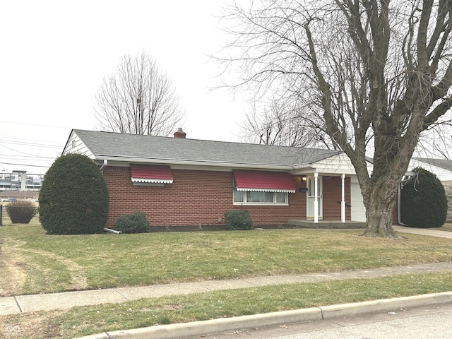 ranch-style home with a front yard