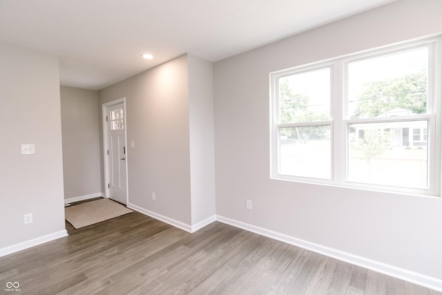 1305 W 23rd St, Indianapolis, IN 46208 - entrance foyer featuring wood finished floors, baseboards, and recessed lighting