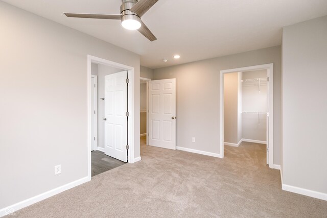 1305 W 23rd St, Indianapolis, IN 46208 - unfurnished bedroom featuring a spacious closet, carpet floors, a closet, baseboards, and recessed lighting