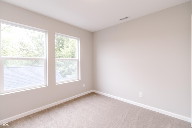 1305 W 23rd St, Indianapolis, IN 46208 - spare room with carpet and baseboards