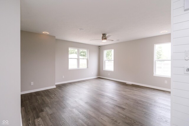 1305 W 23rd St, Indianapolis, IN 46208 - unfurnished room featuring a ceiling fan, dark wood-type flooring, and baseboards