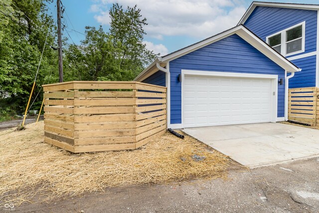 1305 W 23rd St, Indianapolis, IN 46208 - garage featuring driveway