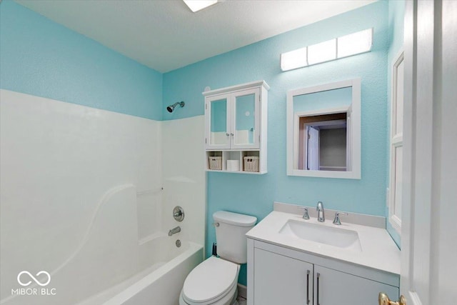 full bath with vanity, toilet, and tub / shower combination