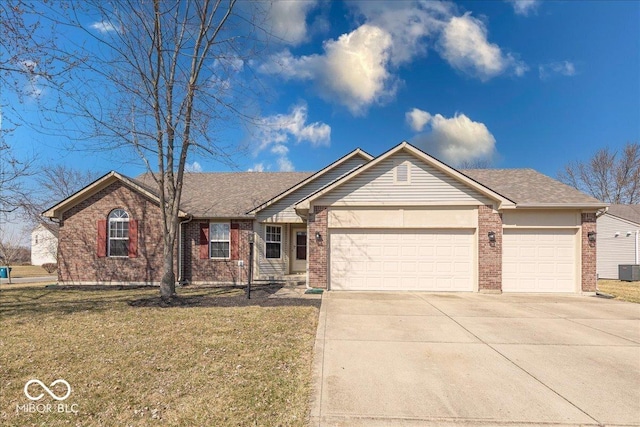 ranch-style home with brick siding, driveway, a front yard, and a garage