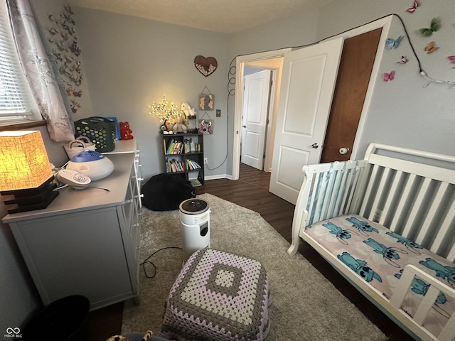 bedroom with wood finished floors