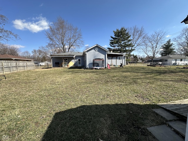 view of yard with a fenced backyard