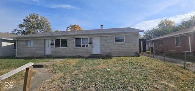 view of front of home featuring a front lawn