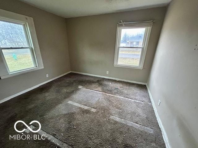 spare room featuring plenty of natural light