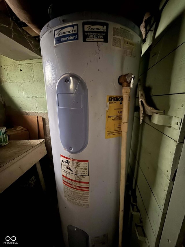 utility room with water heater