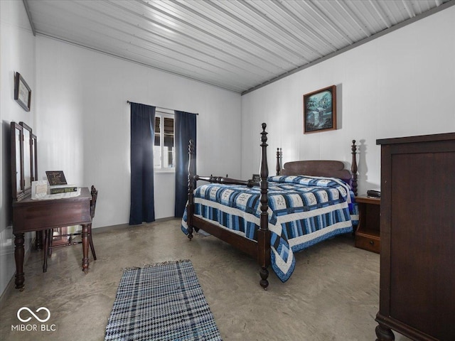bedroom with concrete flooring