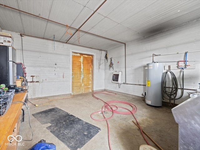 garage with heating unit and water heater