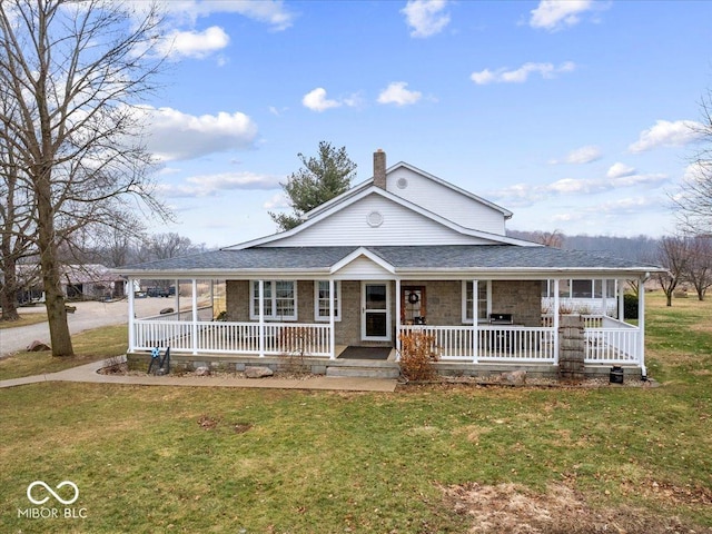 farmhouse with a porch and a front yard