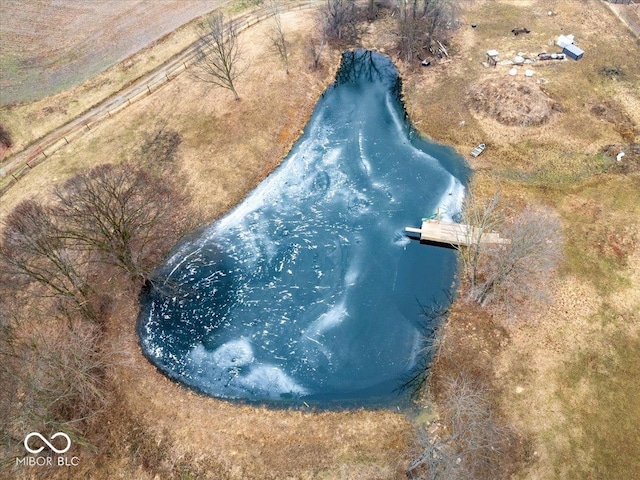 drone / aerial view featuring a water view