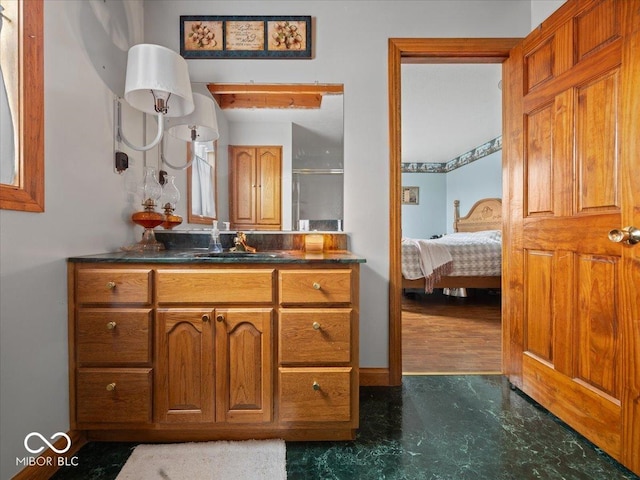 bathroom with vanity and walk in shower