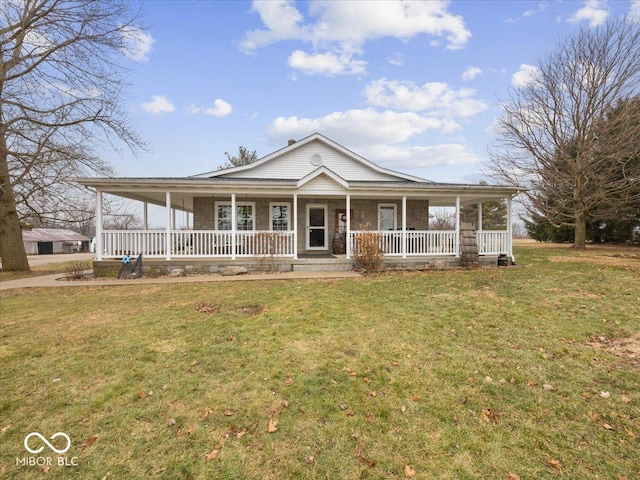 country-style home with a front yard and a porch