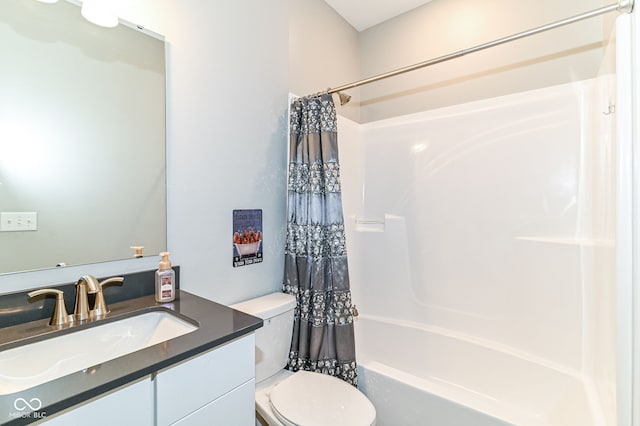 full bathroom featuring toilet, vanity, and shower / tub combo with curtain