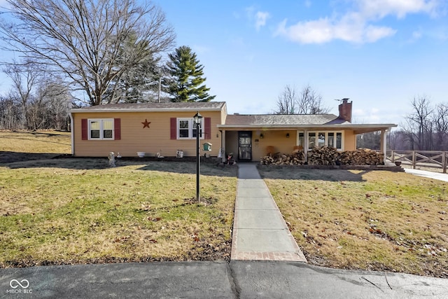 view of front of house featuring a porch and a front yard