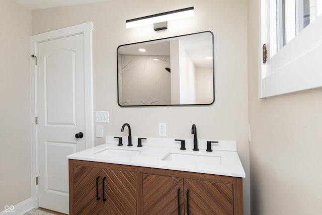 bathroom featuring vanity and walk in shower