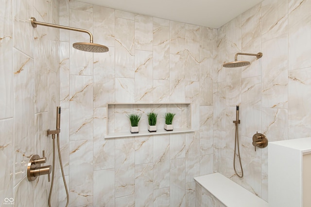 bathroom featuring a tile shower