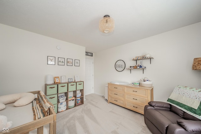 bedroom featuring light colored carpet