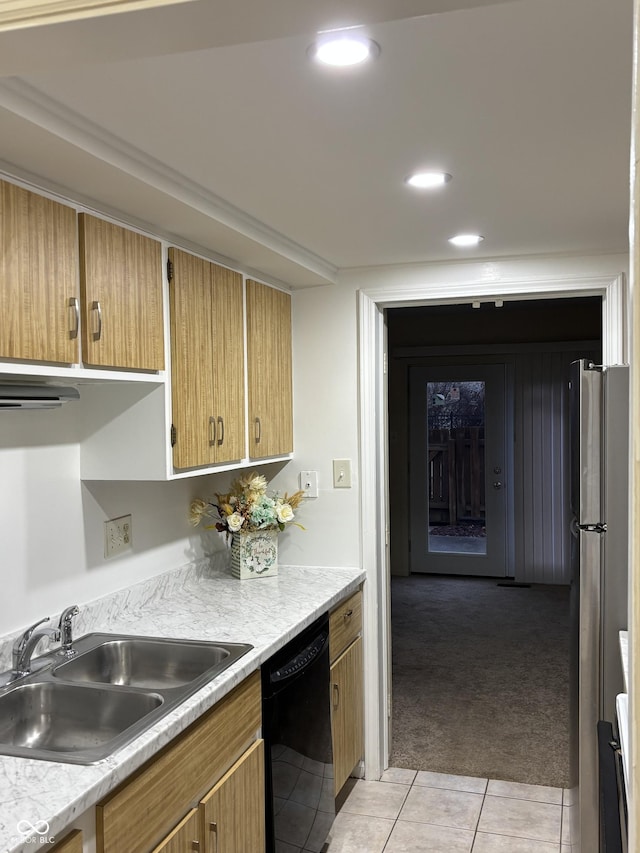 kitchen with dishwasher, sink, light colored carpet, and stainless steel fridge