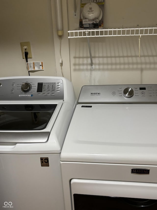 laundry area featuring washer and clothes dryer