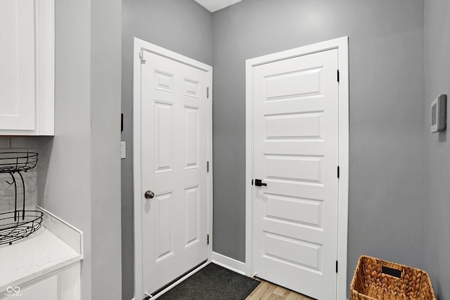 doorway featuring light hardwood / wood-style floors