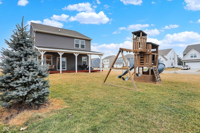 view of play area with a yard