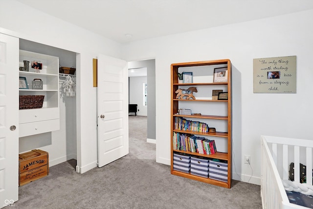 bedroom featuring light carpet