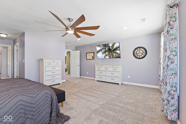 bedroom with baseboards, ceiling fan, visible vents, and light colored carpet