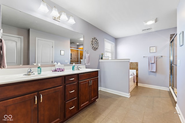 bathroom featuring double vanity, a stall shower, visible vents, a garden tub, and a sink