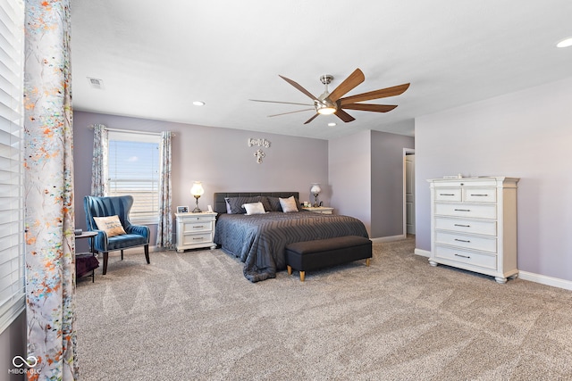 bedroom with recessed lighting, visible vents, light carpet, and baseboards