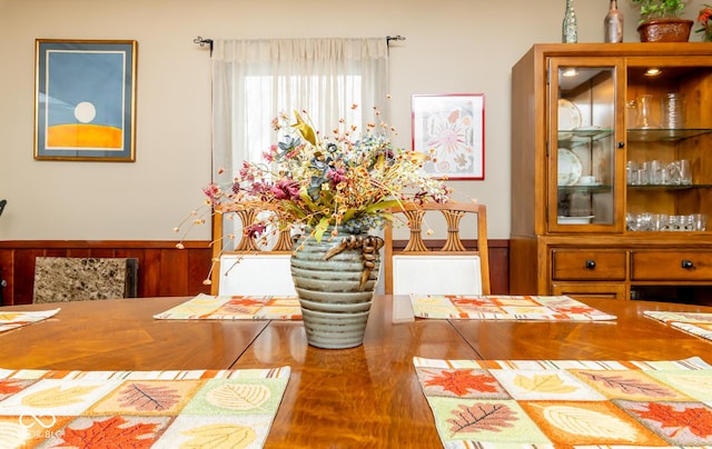 dining room with wainscoting