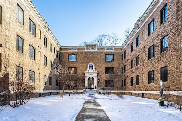 view of snow covered property