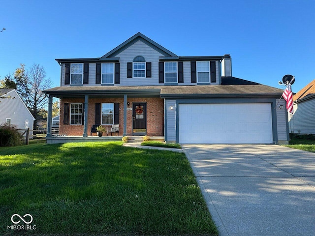 view of front of house with a garage, covered porch, and a front lawn