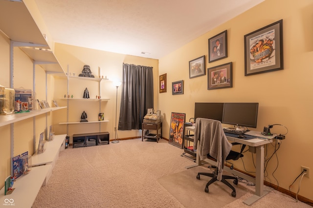 carpeted office with baseboards