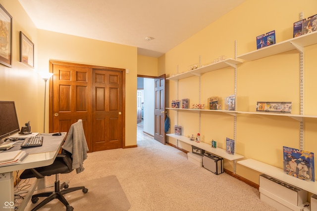 home office featuring carpet flooring and baseboards