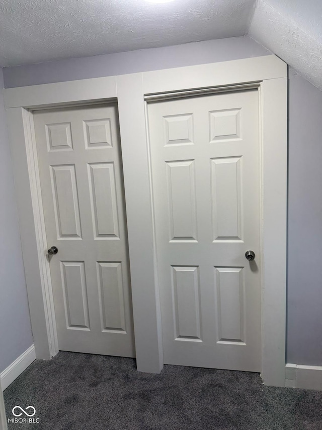 2312 Fletcher St, Anderson, IN 46016 - detailed view of carpet floors, baseboards, and a textured ceiling