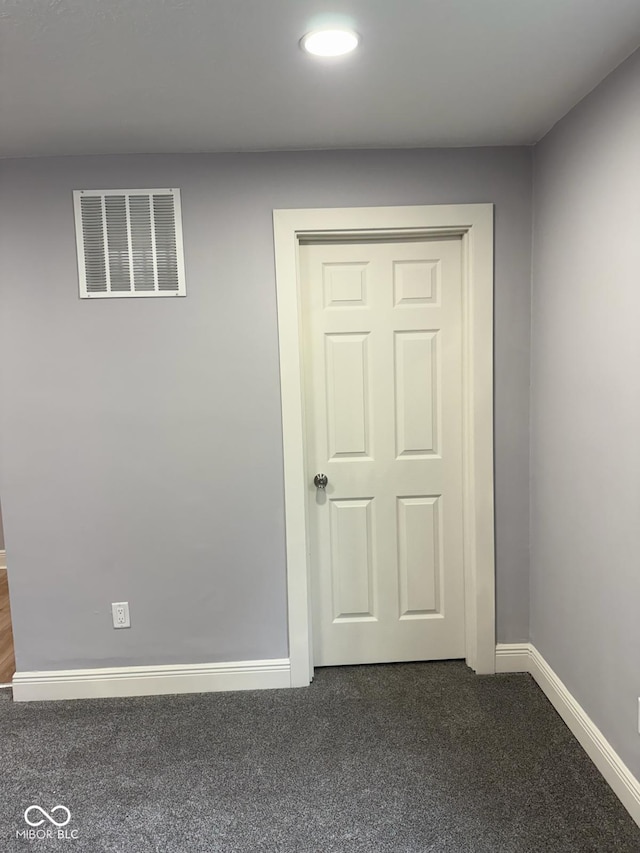 2312 Fletcher St, Anderson, IN 46016 - carpeted empty room with baseboards and recessed lighting