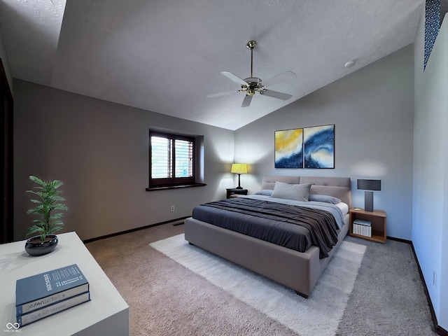 bedroom with carpet floors, baseboards, vaulted ceiling, and ceiling fan