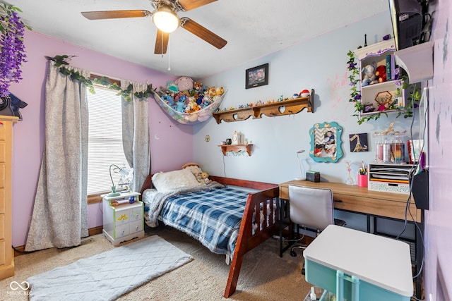 bedroom with baseboards, a ceiling fan, and light colored carpet