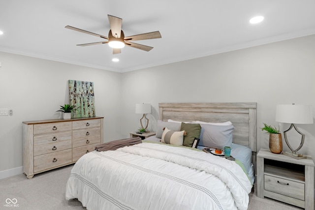 bedroom featuring crown molding, ceiling fan, and light carpet