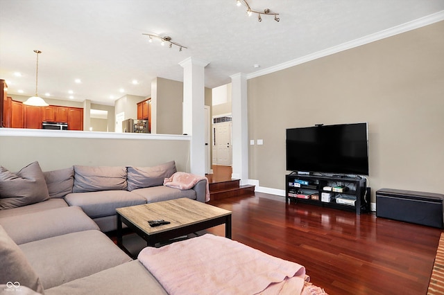 living room featuring dark hardwood / wood-style flooring and ornamental molding