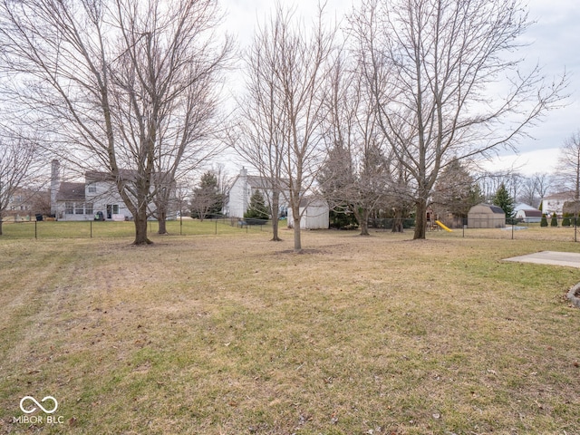 view of yard featuring fence