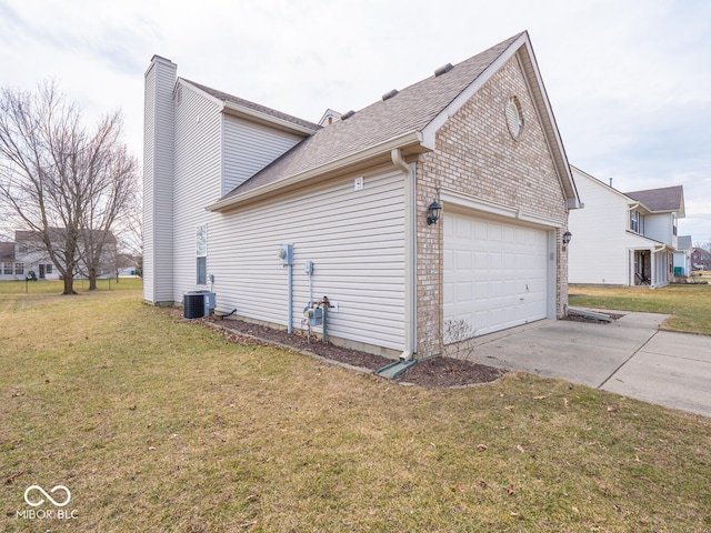 view of property exterior featuring brick siding, central air condition unit, a lawn, an attached garage, and driveway