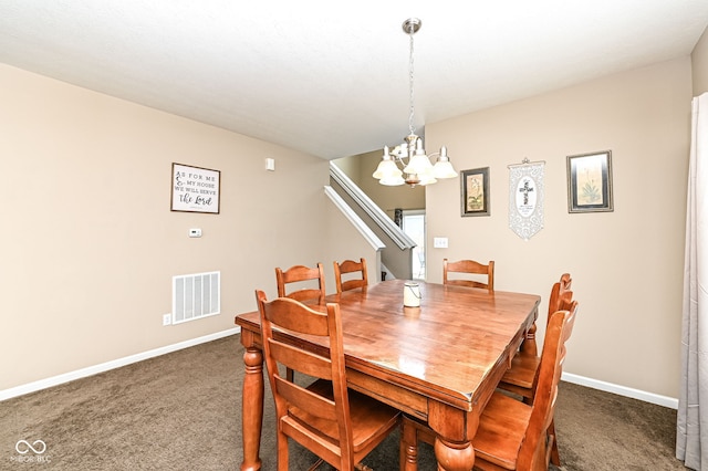 dining space with baseboards, visible vents, dark carpet, and a notable chandelier